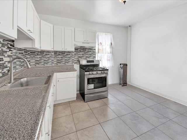 2790 Bainbridge Ave, Bronx, NY 10458 - kitchen with a sink, decorative backsplash, under cabinet range hood, and gas range