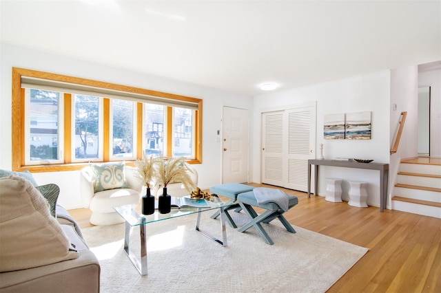 435 Carol Pl, Pelham, NY 10803 - living area featuring light wood-style flooring and stairs