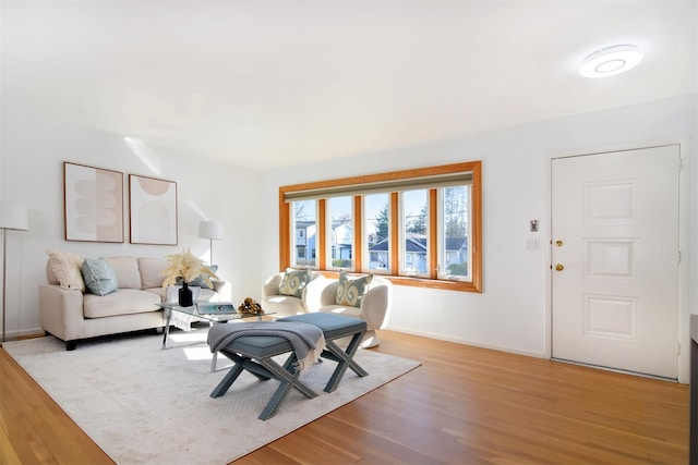 435 Carol Pl, Pelham, NY 10803 - living room with light wood-style flooring and baseboards