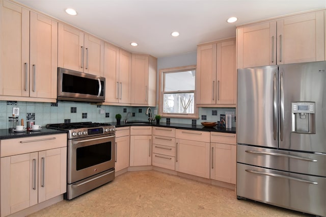 435 Carol Pl, Pelham, NY 10803 - kitchen featuring stainless steel appliances, recessed lighting, a sink, and backsplash