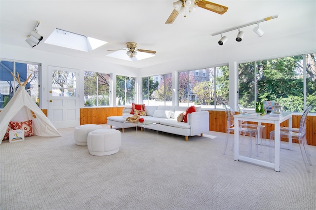 435 Carol Pl, Pelham, NY 10803 - sunroom featuring carpet floors, a wealth of natural light, and rail lighting