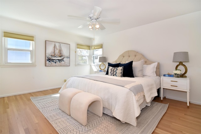 435 Carol Pl, Pelham, NY 10803 - bedroom with baseboards, multiple windows, and wood finished floors