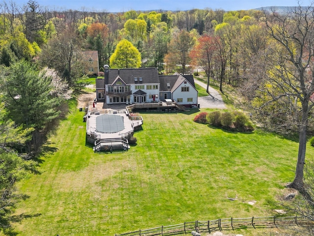 aerial view with a wooded view