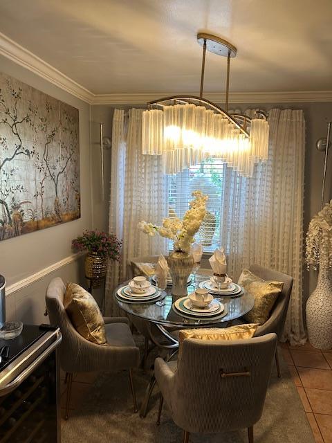 1248 E 84th St, Brooklyn, NY 11236 - tiled dining area with ornamental molding
