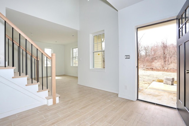334NOhioville Rd, New Paltz, NY 12561 - foyer entrance with stairway, baseboards, and wood finished floors