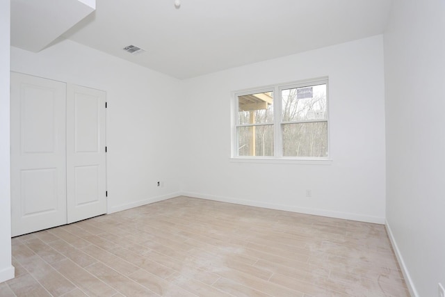 334NOhioville Rd, New Paltz, NY 12561 - unfurnished room with visible vents, light wood finished floors, and baseboards