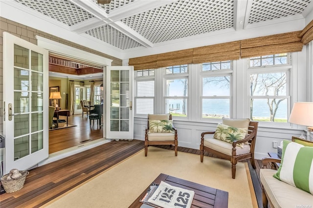 279 Little Neck Rd, Centerport, NY 11721 - sunroom featuring coffered ceiling, a wealth of natural light, wood finished floors, and beam ceiling