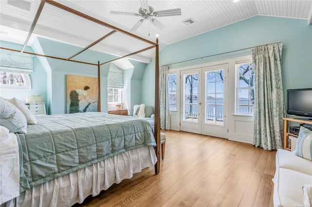 279 Little Neck Rd, Centerport, NY 11721 - bedroom with lofted ceiling, access to exterior, wood finished floors, and french doors