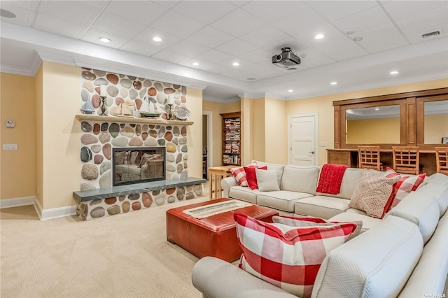 279 Little Neck Rd, Centerport, NY 11721 - living room with visible vents, carpet, crown molding, baseboards, and a stone fireplace