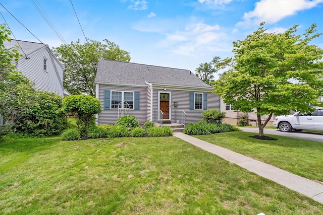 7 Wilson Blvd, Poughkeepsie, NY 12603 - view of front of property with a front yard and a shingled roof