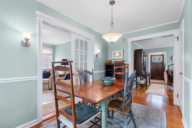 7 Wilson Blvd, Poughkeepsie, NY 12603 - dining space featuring light wood finished floors and ornamental molding