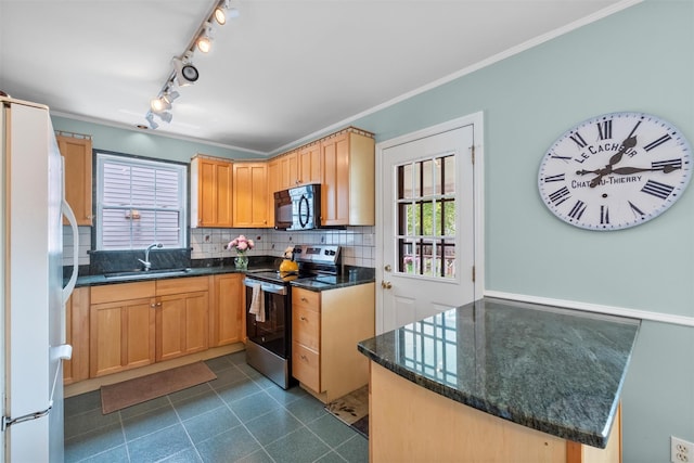 7 Wilson Blvd, Poughkeepsie, NY 12603 - kitchen featuring stainless steel electric range oven, black microwave, freestanding refrigerator, a sink, and tasteful backsplash