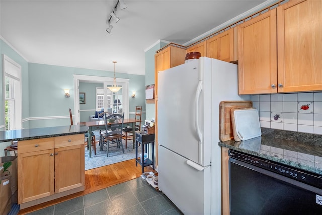 7 Wilson Blvd, Poughkeepsie, NY 12603 - kitchen featuring black dishwasher, freestanding refrigerator, decorative backsplash, pendant lighting, and granite floors