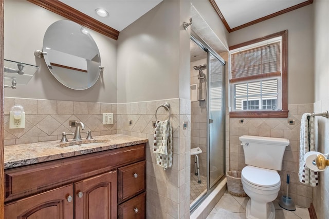 7 Wilson Blvd, Poughkeepsie, NY 12603 - bathroom featuring tile walls, tile patterned flooring, ornamental molding, vanity, and a shower stall