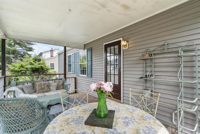 7 Wilson Blvd, Poughkeepsie, NY 12603 - wooden porch with outdoor dining area and an outdoor hangout area