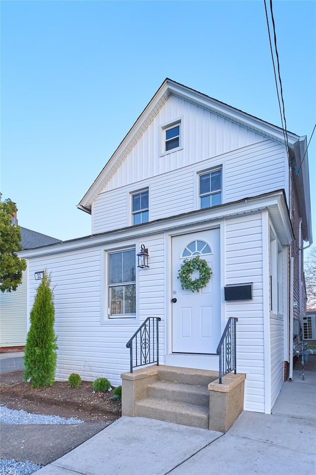 view of front facade with board and batten siding