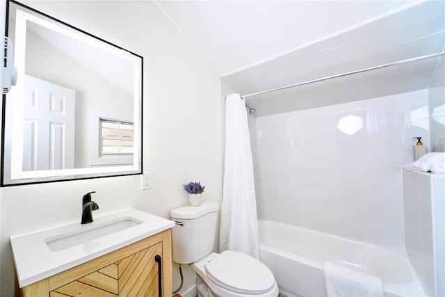 bathroom featuring vanity, shower / bath combo, and toilet