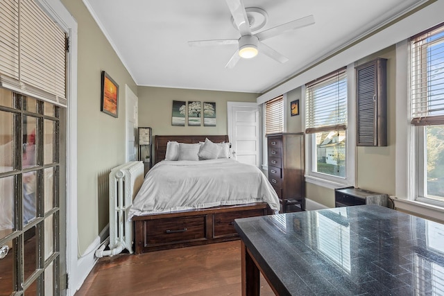 108 Wayne Ave, White Plains, NY 10606 - bedroom featuring radiator, dark wood-style flooring, multiple windows, and ornamental molding