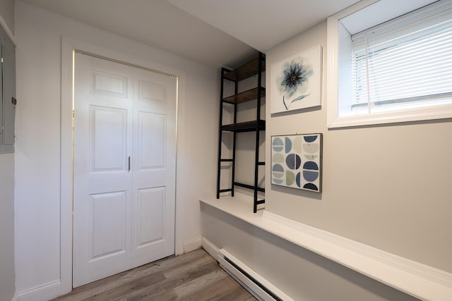 108 Wayne Ave, White Plains, NY 10606 - hall featuring wood finished floors and a baseboard radiator
