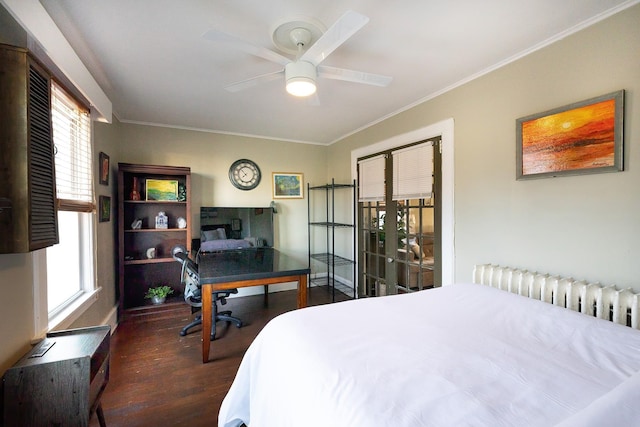 108 Wayne Ave, White Plains, NY 10606 - bedroom with radiator, dark wood-style flooring, crown molding, a ceiling fan, and french doors