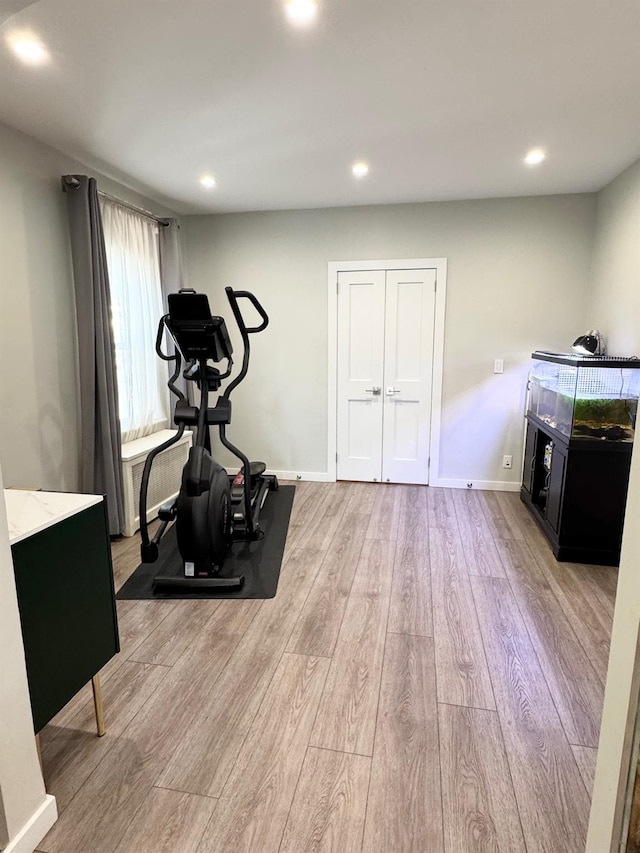 212-04 50th Ave, Bayside, NY 11364 - exercise area with light wood-type flooring, recessed lighting, and baseboards