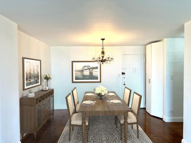 61-20 Grand Central Pkwy Unit A1402, Forest Hills, NY 11375 - dining space featuring a chandelier, baseboards, and parquet flooring