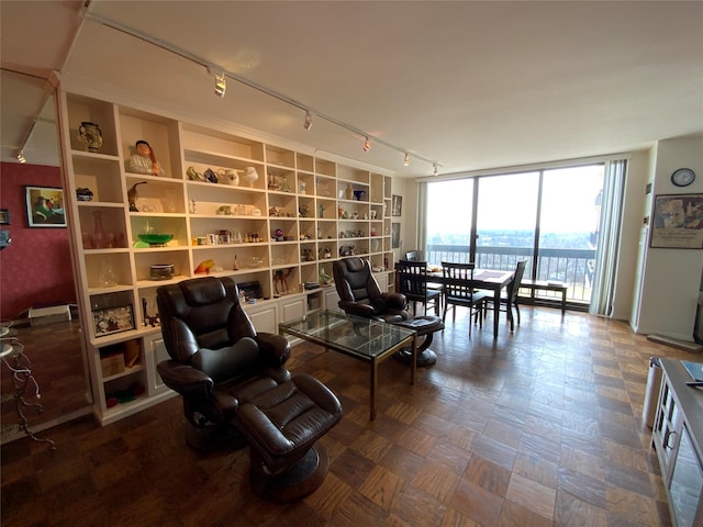 living area featuring a wall of windows