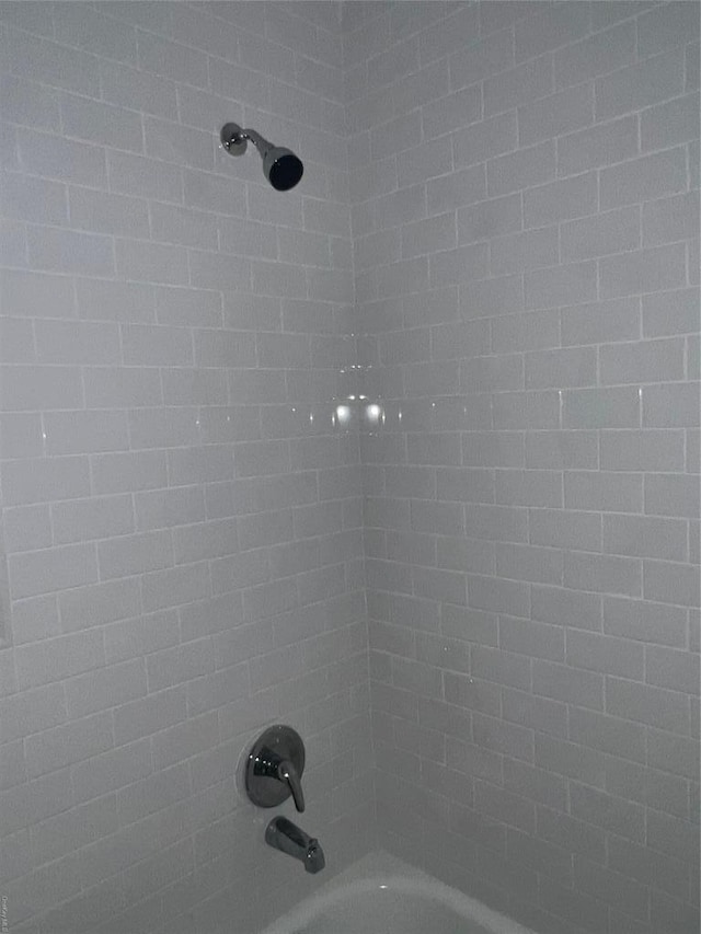 91 Tulip Ave Unit B-2, Floral Park, NY 11001 - interior details featuring shower / bathtub combination
