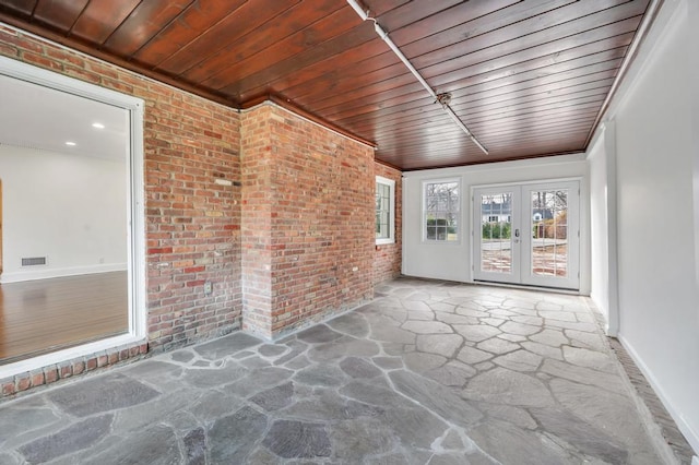 85 Station Rd, Great Neck, NY 11023 - unfurnished sunroom with french doors and visible vents
