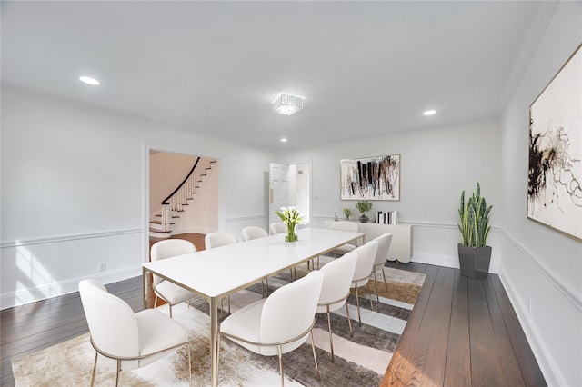 85 Station Rd, Great Neck, NY 11023 - dining space featuring baseboards, recessed lighting, stairway, and hardwood / wood-style floors
