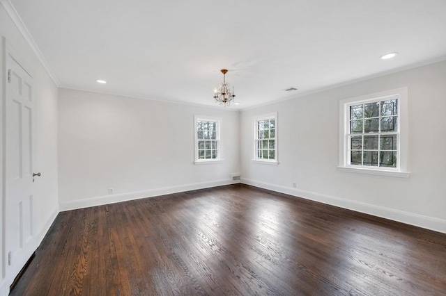 85 Station Rd, Great Neck, NY 11023 - unfurnished room featuring visible vents, a chandelier, crown molding, baseboards, and dark wood-type flooring