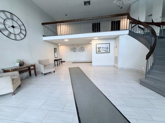 20921 26th Ave Unit 1G, Bayside, NY 11360 - building lobby featuring stairway