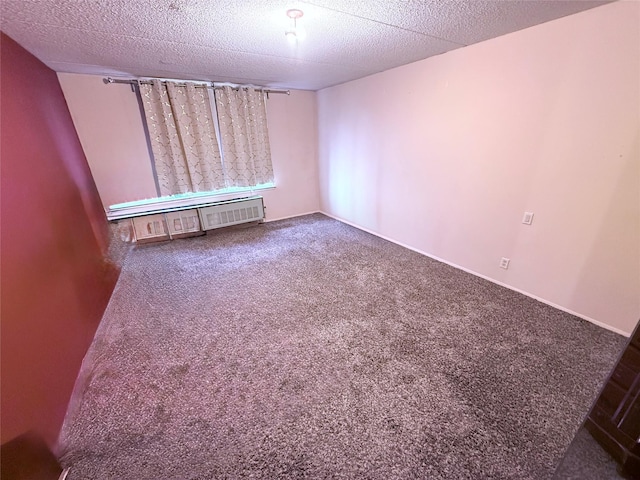 20921 26th Ave Unit 1G, Bayside, NY 11360 - carpeted empty room featuring a textured ceiling
