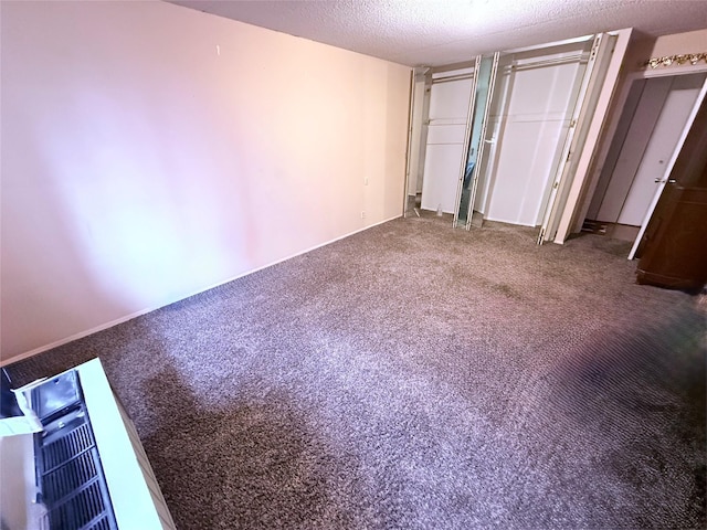 20921 26th Ave Unit 1G, Bayside, NY 11360 - interior space with multiple closets, a textured ceiling, and carpet