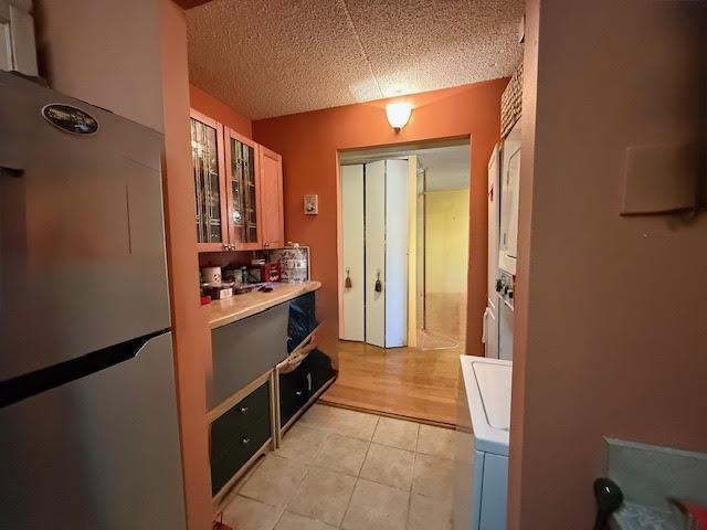20921 26th Ave Unit 1G, Bayside, NY 11360 - hall featuring light tile patterned floors