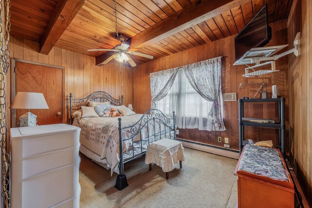 carpeted bedroom featuring wooden walls, baseboard heating, wooden ceiling, and beamed ceiling