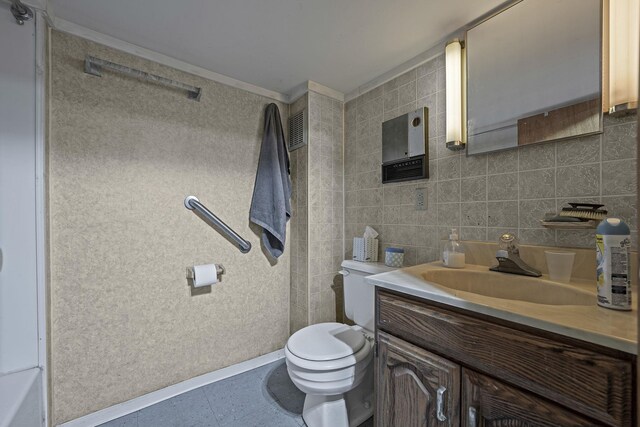 bathroom with vanity, visible vents, toilet, tile walls, and tasteful backsplash