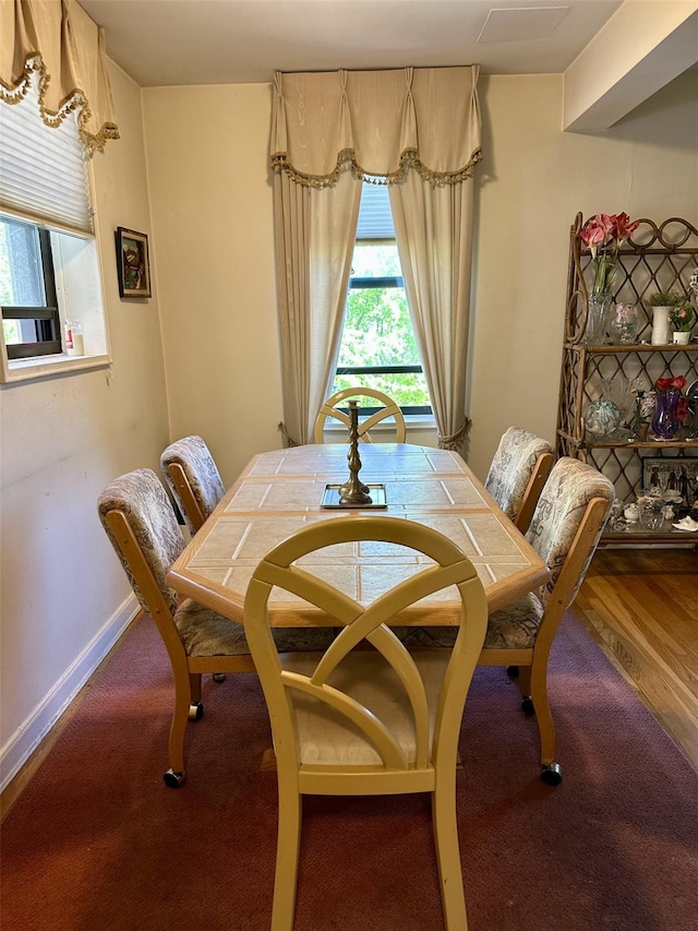 view of carpeted dining space