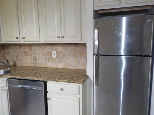 260-37 Union Tpke Fl 2Nd, Glen Oaks, NY 11004 - kitchen with stone countertops, decorative backsplash, a sink, and stainless steel appliances
