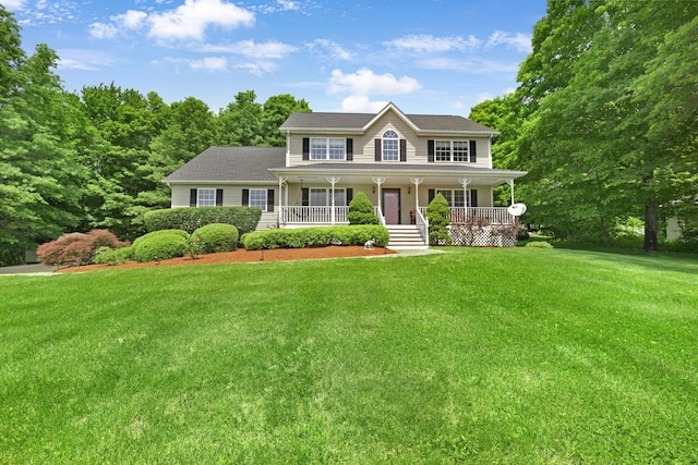 34 Melissa Ln, Washingtonville, NY 10992 - colonial home featuring covered porch, a front lawn, and roof with shingles