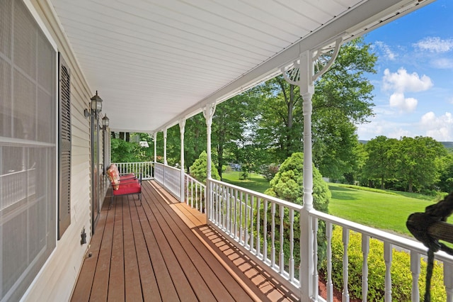 34 Melissa Ln, Washingtonville, NY 10992 - wooden porch with a yard and view of wooded area