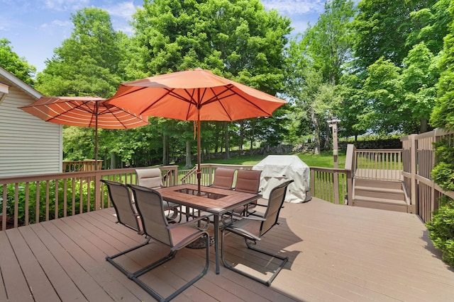 34 Melissa Ln, Washingtonville, NY 10992 - wooden terrace featuring outdoor dining area, a lawn, view of scattered trees, and a grill