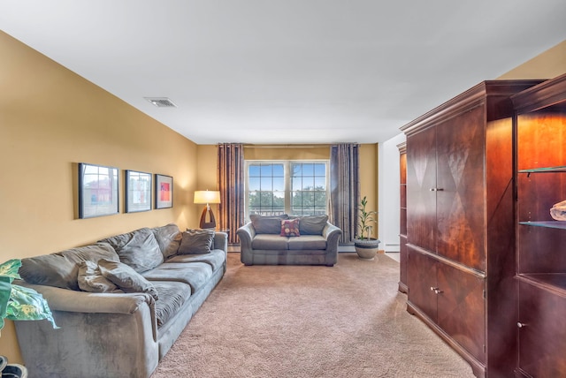 34 Melissa Ln, Washingtonville, NY 10992 - living room with carpet flooring and a baseboard heating unit