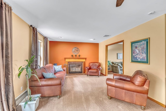 34 Melissa Ln, Washingtonville, NY 10992 - carpeted living area with baseboard heating and a glass covered fireplace