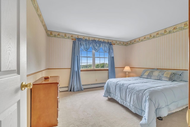 34 Melissa Ln, Washingtonville, NY 10992 - carpeted bedroom with wallpapered walls and a baseboard heating unit