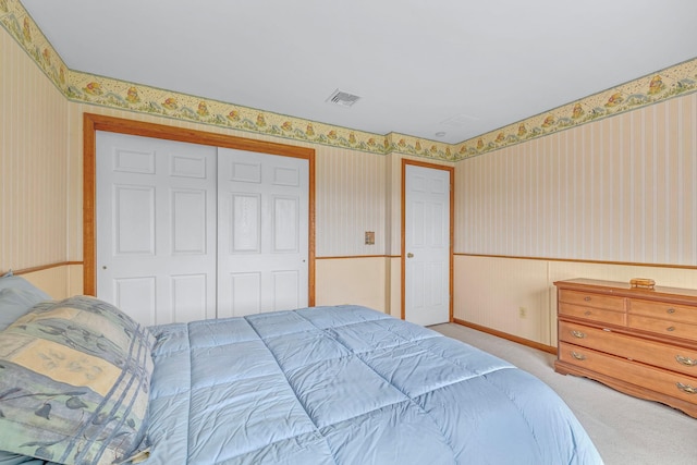 34 Melissa Ln, Washingtonville, NY 10992 - bedroom with wallpapered walls, wainscoting, light colored carpet, and a closet