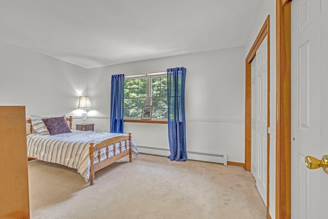 34 Melissa Ln, Washingtonville, NY 10992 - carpeted bedroom with a baseboard heating unit