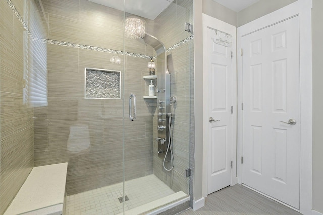 full bathroom with a shower stall