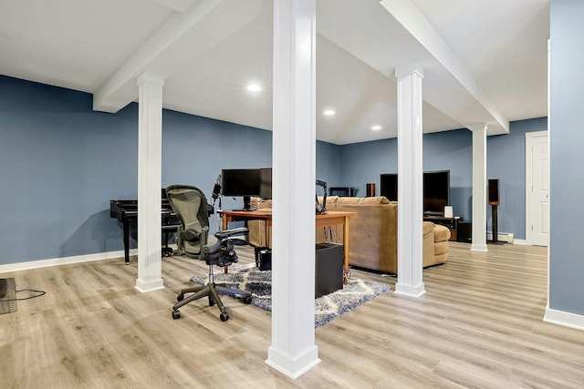 interior space with a baseboard radiator, wood finished floors, recessed lighting, and baseboards