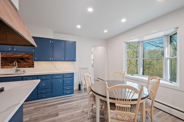 4 Penn Ct, Dix Hills, NY 11746 - dining space featuring recessed lighting, a baseboard radiator, and light wood-type flooring